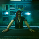 Claire waits at the Afterlife bar for the player to accept her quest.